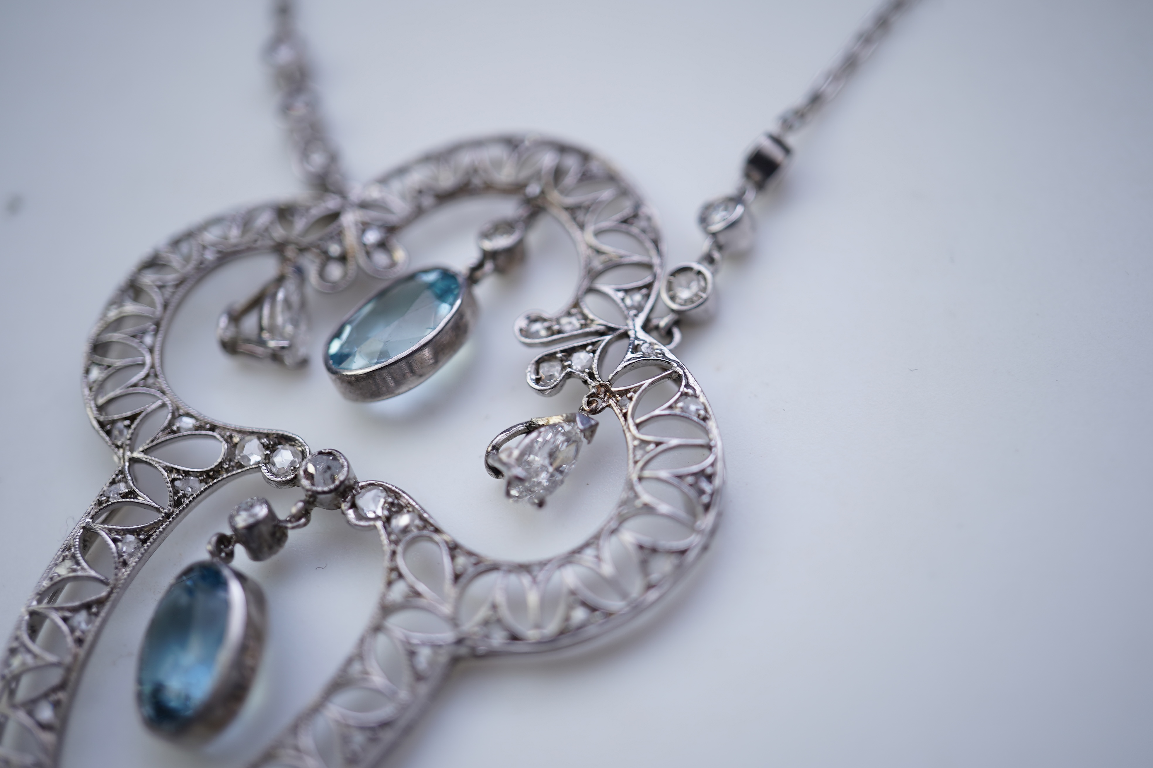 An Edwardian aquamarine and diamond pendant, circa 1910
